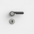FSB 1138 Drückergarnitur von Dieter Rams rgs mit Rundrosetten in Aluminium Pure 0013 und Schwarz 0810, freigestellte Produktansicht.