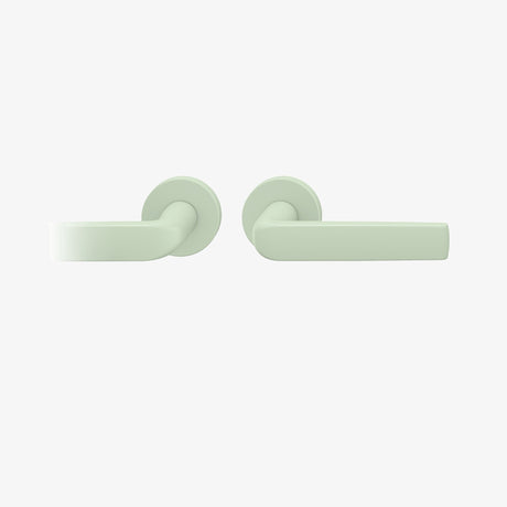 FSB 1267 Drückergarnitur ohne Schlüsselrosetten mit Rundrosetten in Les Couleurs® Le Corbusier® Vert Anglais Pâle, freigestellte Produktansicht.